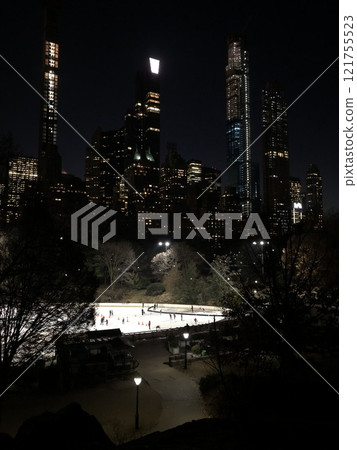 people enjoy the ice rink in Central Park in New York City, Manhattan, NYC, NY, USA people enjoy the ice rink in Central Park in New York City, Manhattan, NYC, NY, USA 121755523