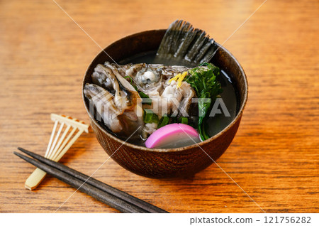 Black soy beef soup 121756282
