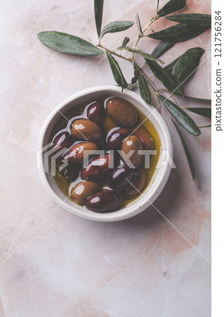 Natural kalamata olives in oil with spices. Mediterranean food concept. 121756284