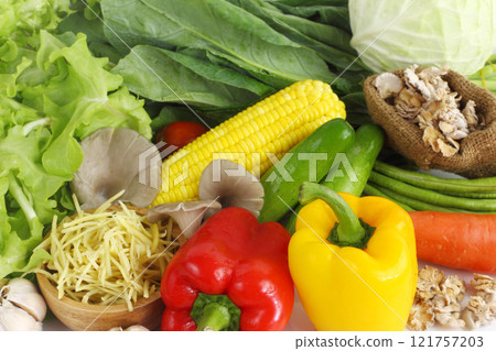 Group of many colorful vegetables isolated on white background Group of many colorful vegetables isolated on white background 121757203