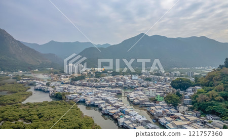 Traditional Fishing Village with Boats Along River, Tai O Dec 31 2024 121757360