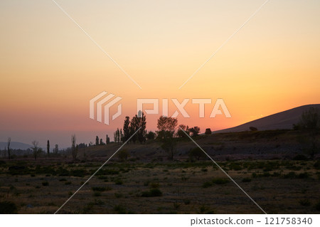 Pink and yellow sunset, rural landscape Pink and yellow sunset, rural landscape 121758340