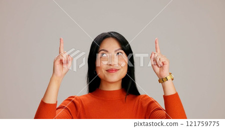 Asian woman, point up and smile with choice, promotion and deal with mock up space by background. Japanese girl, person and model with direction, decision and show with sign, emoji or announcement Asian woman, point up and smile with choice, promotion and deal with mock up space by background. Japanese girl, person and model with direction, decision and show with sign, emoji or announcement 121759775