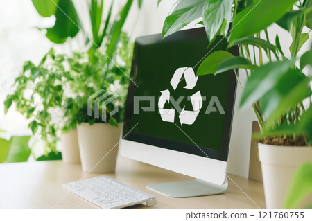 Green technology concept with recycling symbol on computer screen near indoor plants, AI Generative 121760755