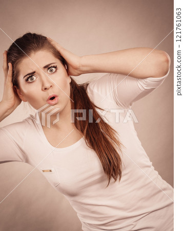 Shocked amazed young woman woman Shocked amazed young woman woman 121761063