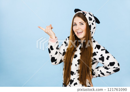 Woman wearing pajamas cartoon pointing Woman wearing pajamas cartoon pointing 121761090