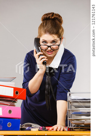 Happy secretary business woman in office Happy secretary business woman in office 121761143