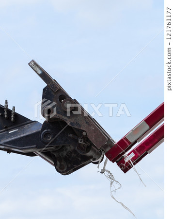 Forklift loader on sky background Forklift loader on sky background 121761177