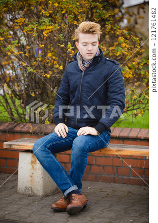Young handsome man outdoors Young handsome man outdoors 121761482