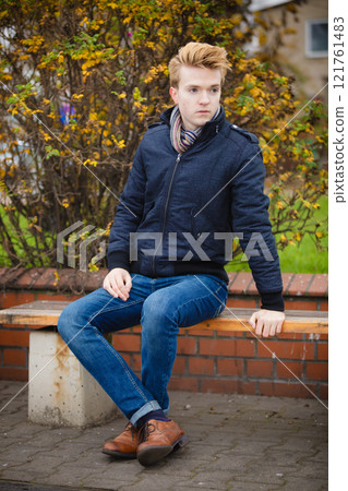 Young handsome man outdoors Young handsome man outdoors 121761483