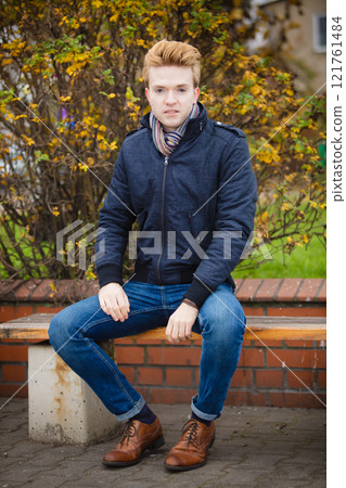 Young handsome man outdoors Young handsome man outdoors 121761484