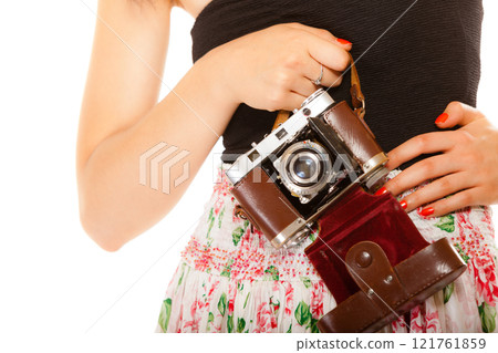 old camera in female hands old camera in female hands 121761859