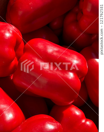 Red bell pepper closeup, wallpaper, pattern. The concept of crop, veggie nutrition, vitamin food. 121762581