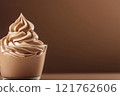 Side view of mocha or chocolate mousse dessert with smooth rich texture, soft brown background. Color trend concept, color of the year 2025. Banner with copy space. 121762606