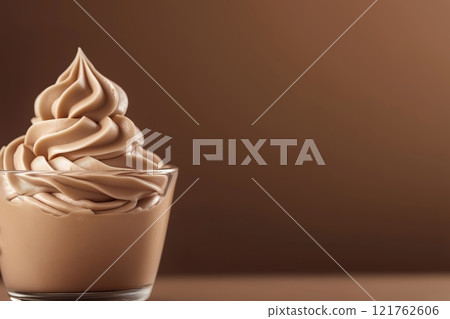 Side view of mocha or chocolate mousse dessert with smooth rich texture, soft brown background. Color trend concept, color of the year 2025. Banner with copy space. Side view of mocha or chocolate mousse dessert with smooth rich texture, soft brown background. Color trend concept, color of the year 2025. Banner with copy space. 121762606
