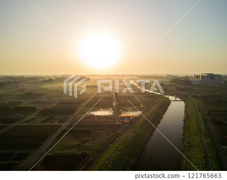 Aerial view of the Minuma rice fields in Saitama Prefecture, shrouded in spring haze Aerial view of the Minuma rice fields in Saitama Prefecture, shrouded in spring haze 121765663