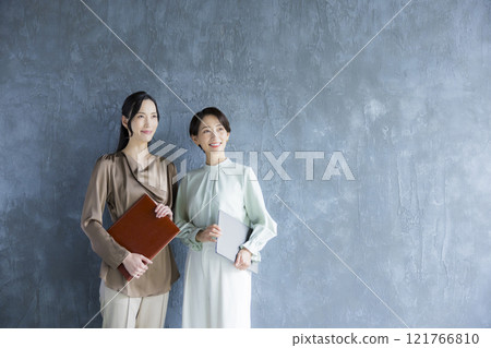 A woman with a laptop A woman with a laptop 121766810