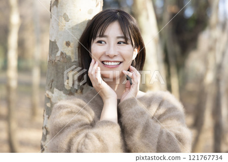 Woman relaxing in nature Woman relaxing in nature 121767734