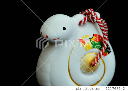 New Year's material: Year of the snake, Chinese zodiac clay bell, black background 121768642