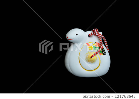 New Year's material: Year of the snake, Chinese zodiac clay bell, black background New Year's material: Year of the snake, Chinese zodiac clay bell, black background 121768645