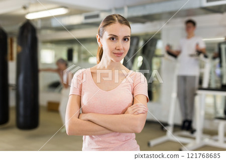 Portrait of woman standing in gym Portrait of woman standing in gym 121768685