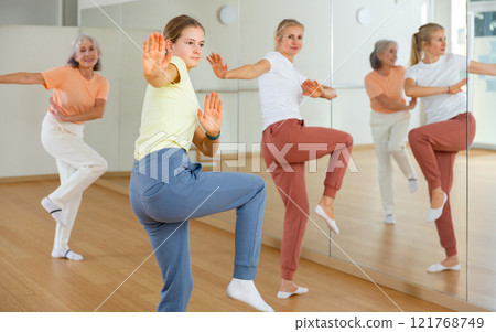 Group of women dancing modern dance Group of women dancing modern dance 121768749