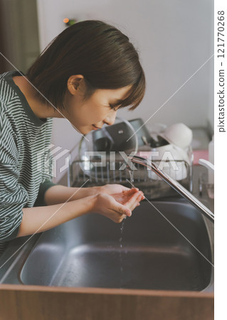 Wash your face with water in the morning 121770268