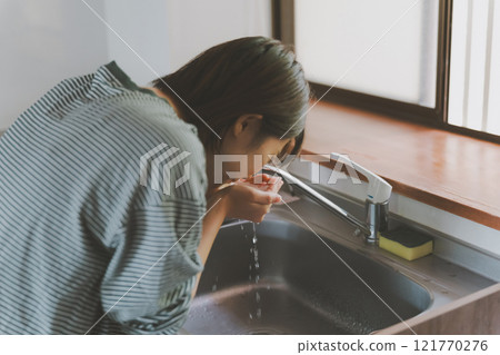 Wash your face with water in the morning 121770276