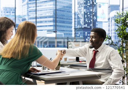 HR expert reviewing candidate with impairment, asking questions about qualifications. Person with disability getting hired for inclusive company after proving enthusiasm for job opportunity HR expert reviewing candidate with impairment, asking questions about qualifications. Person with disability getting hired for inclusive company after proving enthusiasm for job opportunity 121770541