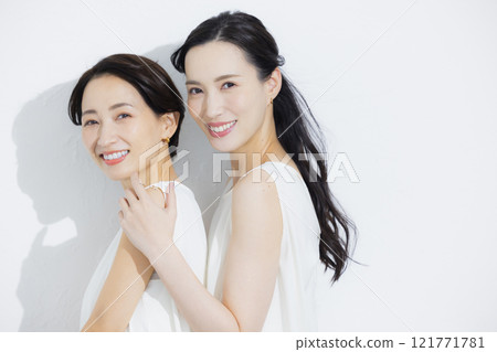 Two cuddling women Two cuddling women 121771781