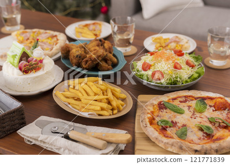 A sumptuous meal on the table at a Christmas party 121771839