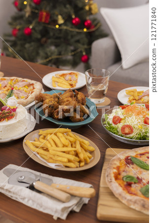 A sumptuous meal on the table at a Christmas party 121771840