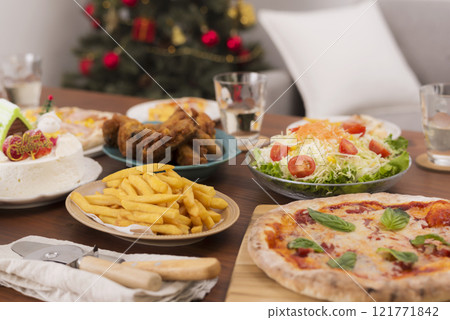 A sumptuous meal on the table at a Christmas party 121771842