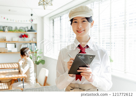 Female clerk cafe 121772612