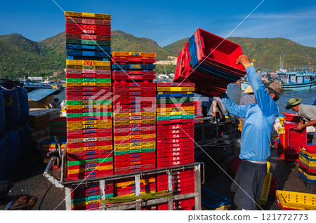 local Asian fish market in the harbor where the goods are being unloaded local Asian fish market in the harbor where the goods are being unloaded 121772773