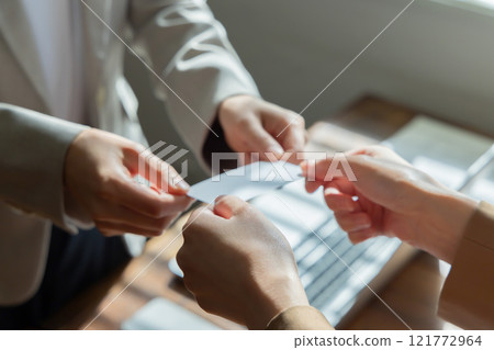 Business card exchange 121772964