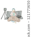 A woman and a cat relaxing while watching a video 121773650