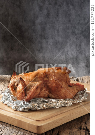 Freshly Baked Roasted Chicken with aluminum foil Freshly Baked Roasted Chicken with aluminum foil 121774223