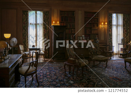 Luxury interior of home library Sitting room with elegant furniture at Vanderbilt Museum Long Island Luxury interior of home library Sitting room with elegant furniture at Vanderbilt Museum Long Island 121774552