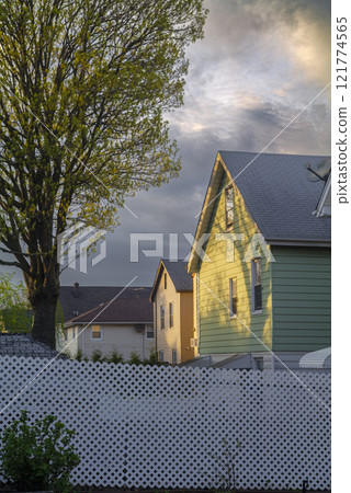 American House in Wallington New Jersey Behind the Fence Backyard View on Sunset American House in Wallington New Jersey Behind the Fence Backyard View on Sunset 121774565