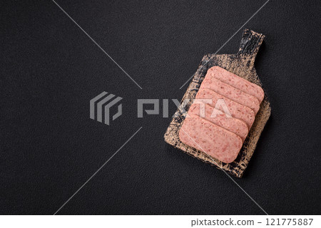 Delicious canned pink spiced ham or spam with salt, spices and herbs Delicious canned pink spiced ham or spam with salt, spices and herbs 121775887