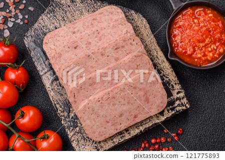 Delicious canned pink spiced ham or spam with salt, spices and herbs Delicious canned pink spiced ham or spam with salt, spices and herbs 121775893