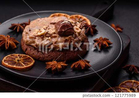 Sweet oatmeal cookies with buttercream or peanut butter 121775989