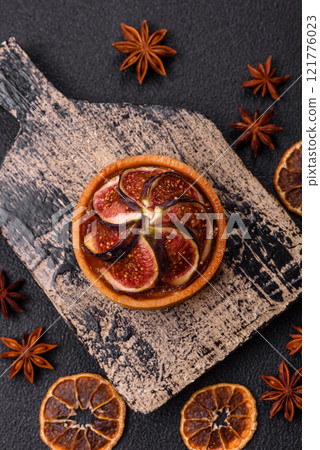 Sweet tart with figs, cheese cream and pecans Sweet tart with figs, cheese cream and pecans 121776023