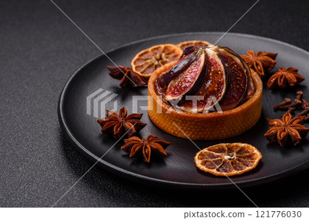 Sweet tart with figs, cheese cream and pecans 121776030