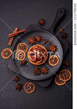 Sweet tart with figs, cheese cream and pecans 121776038