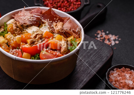 Appetizing salad with prosciutto, pumpkin, cheese and tomatoes Appetizing salad with prosciutto, pumpkin, cheese and tomatoes 121776246