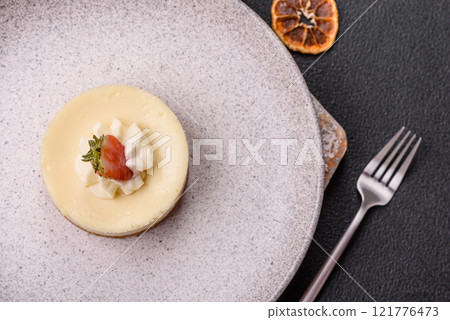 Sweet cheesecake tart with strawberries and mascarpone 121776473
