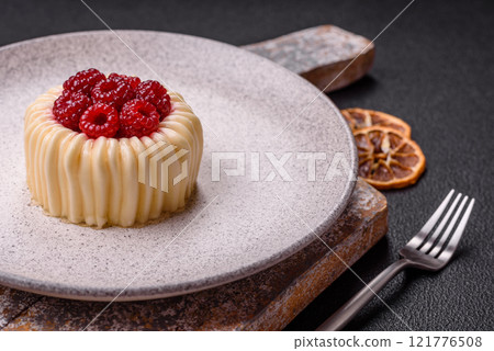 Sweet mousse tart with raspberries and filling Sweet mousse tart with raspberries and filling 121776508