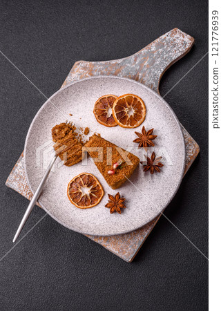 Piece of sweet layered honey cake 121776939